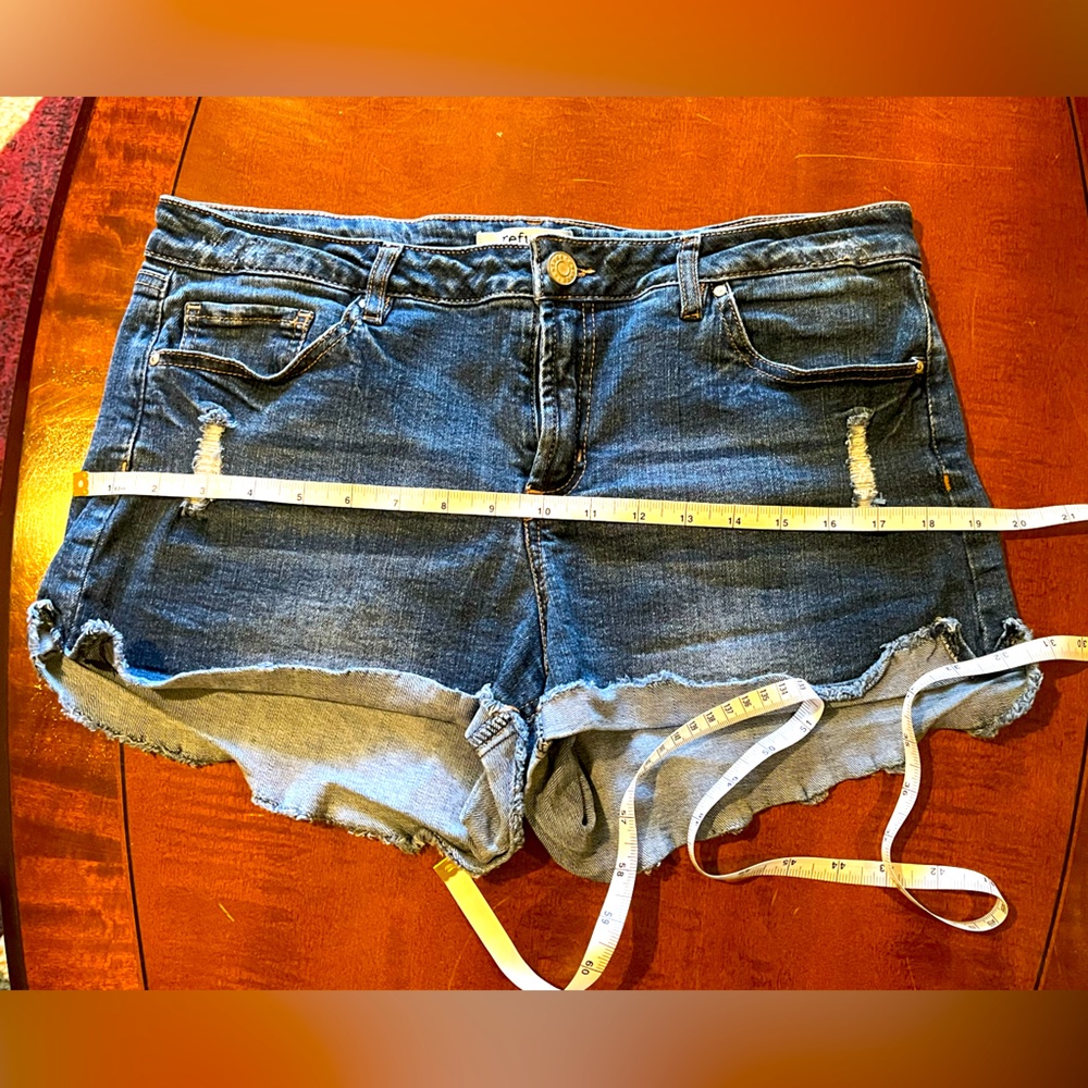 Distressed ripped denim shorts. High-rise, 5 pockets. Medium washed blue. Sz 12 - Picture 7 of 8